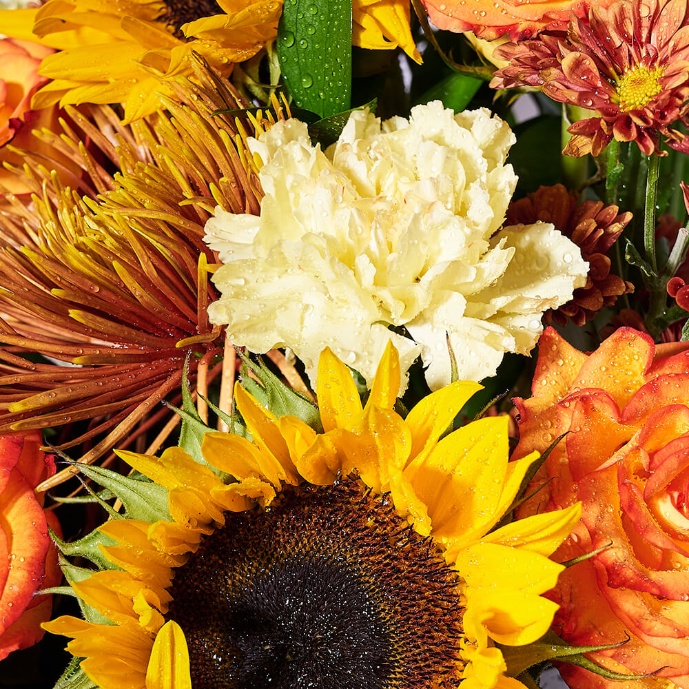 Seasonal Yellow and Bronze Fall Flower Arrangement – how the gift is presented