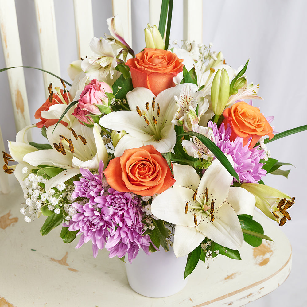 Lavender Scented Candle with Mixed Floral Arrangement in Ceramic Vessel – how the gift is presented