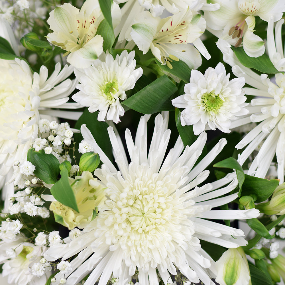 White floral mixed hat box arrangement. Blooms America Delivery.