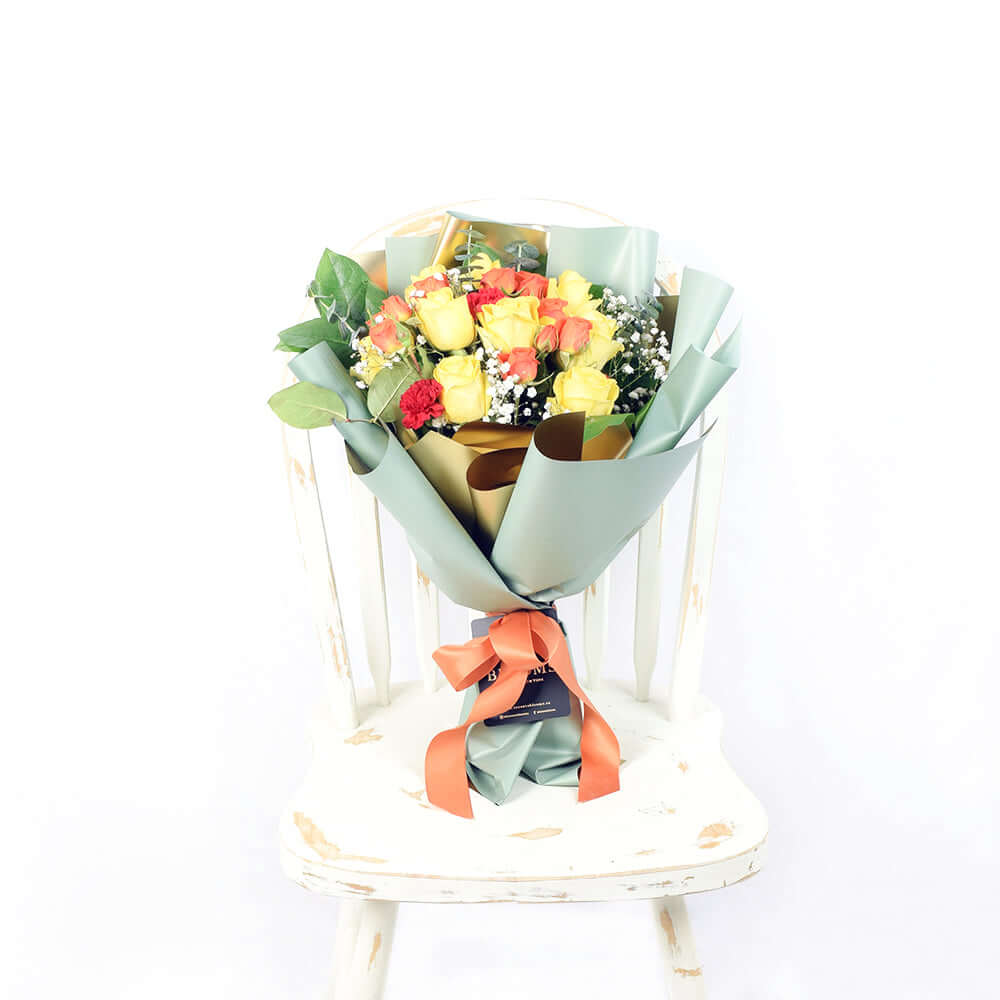 Mixed Roses and Carnations Floral Wrap Bouquet – how the gift is presented