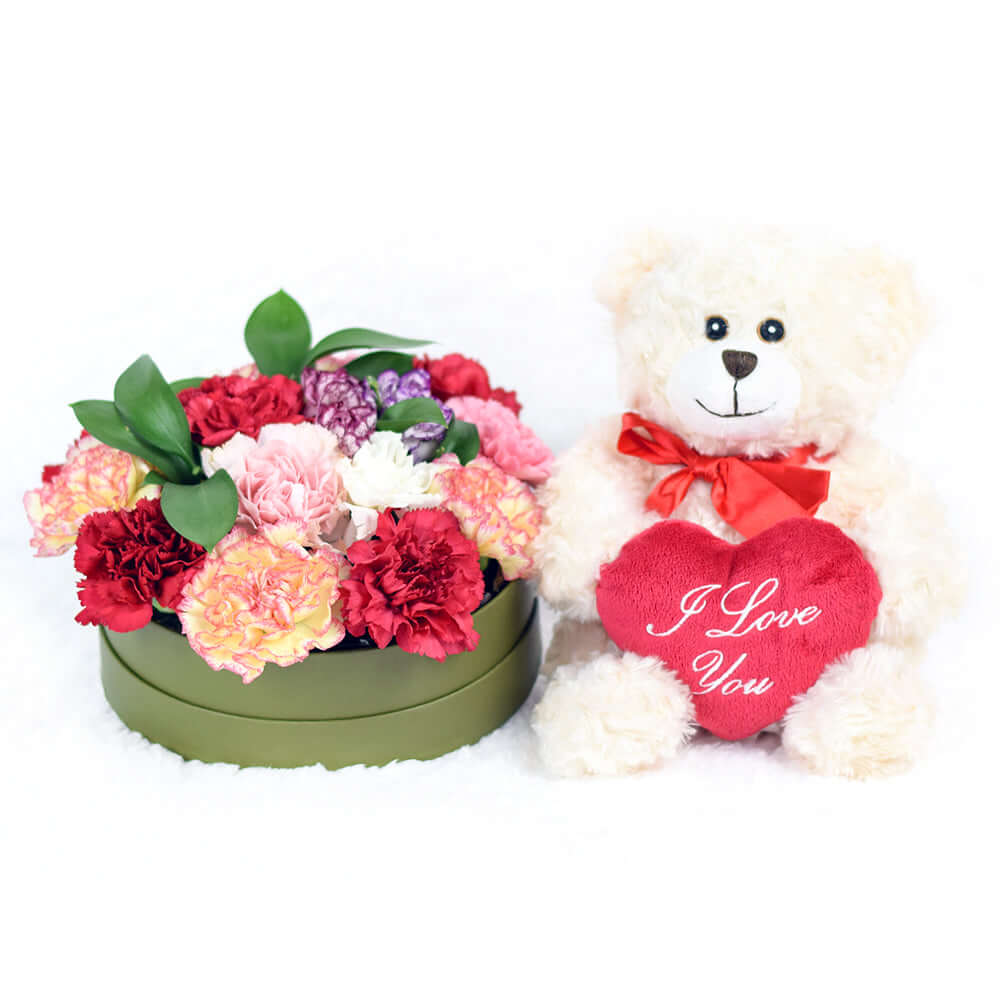 Hat Box with Multi-Colored Carnations, Ruscus, and 'I Love You' Teddy – how the gift is presented