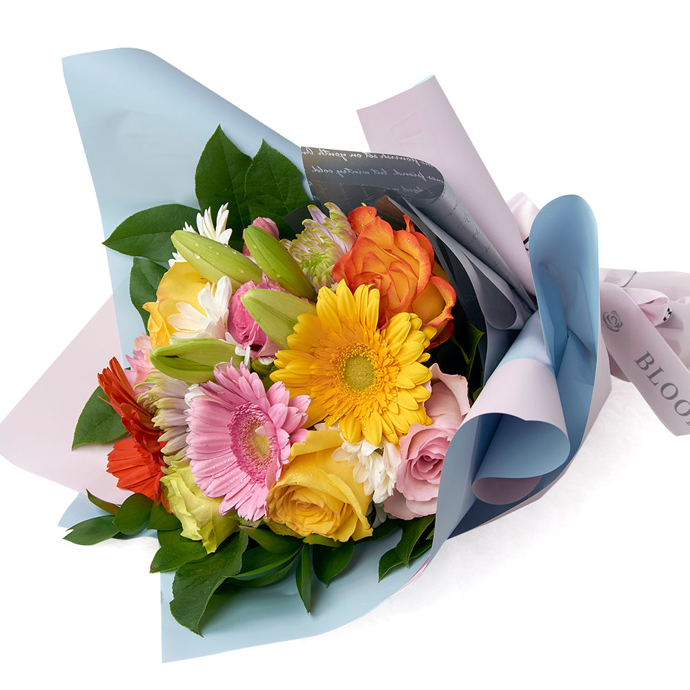 Caribbean Sunrise Mixed Floral Bouquet. Multi-coloured mixed floral bouquet from America Blooms - Same Day America Delivery.