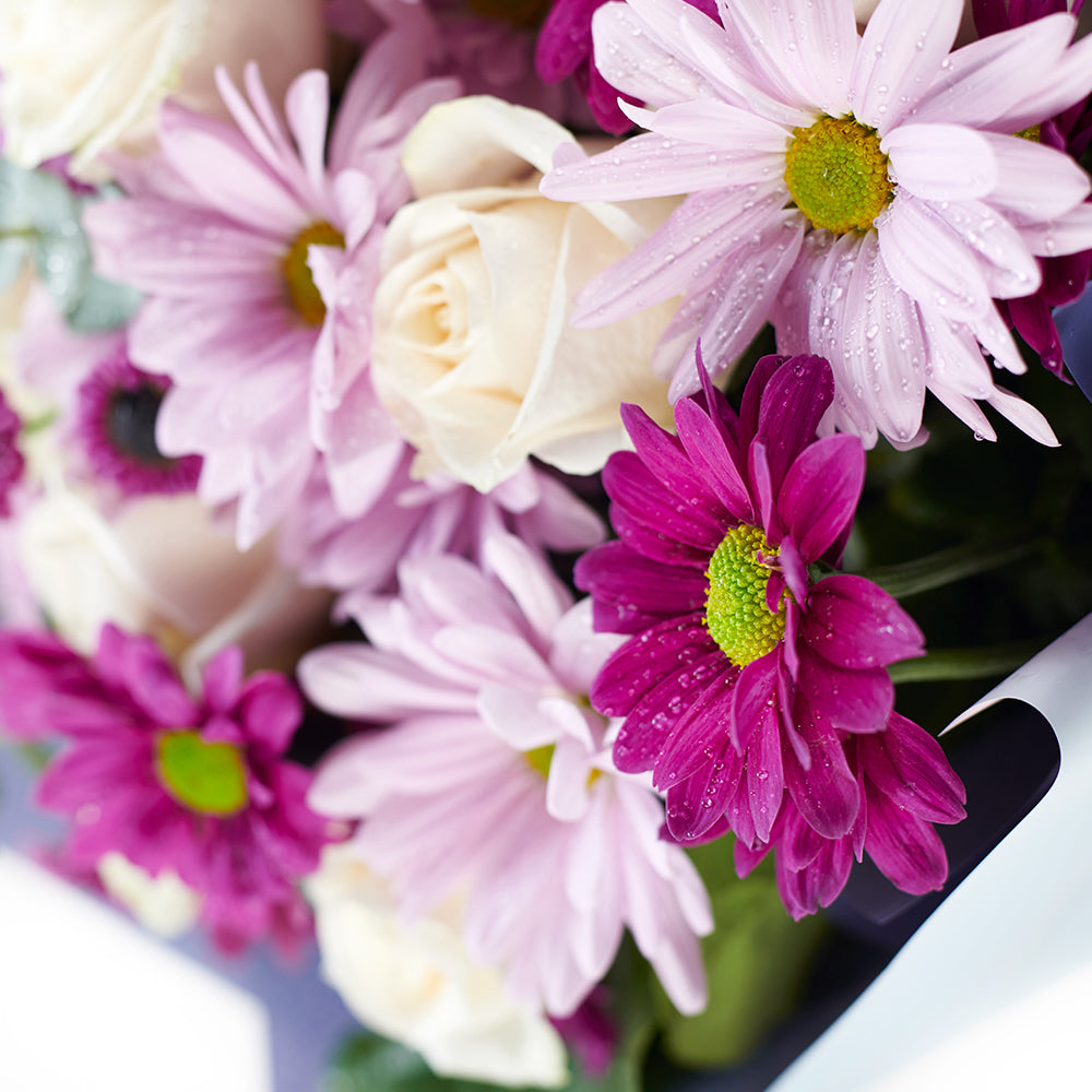 Mixed lavender floral gift set with chocolates. Blooms America  Delivery.