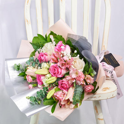 Pastel Dreams Mixed Rose Bouquet, is one of our most popular flower gifts from America Blooms - Same Day America Delivery.