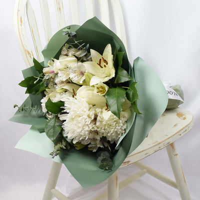 White rose, lily, and alstroemeria mixed bouquet. Blooms America Delivery.