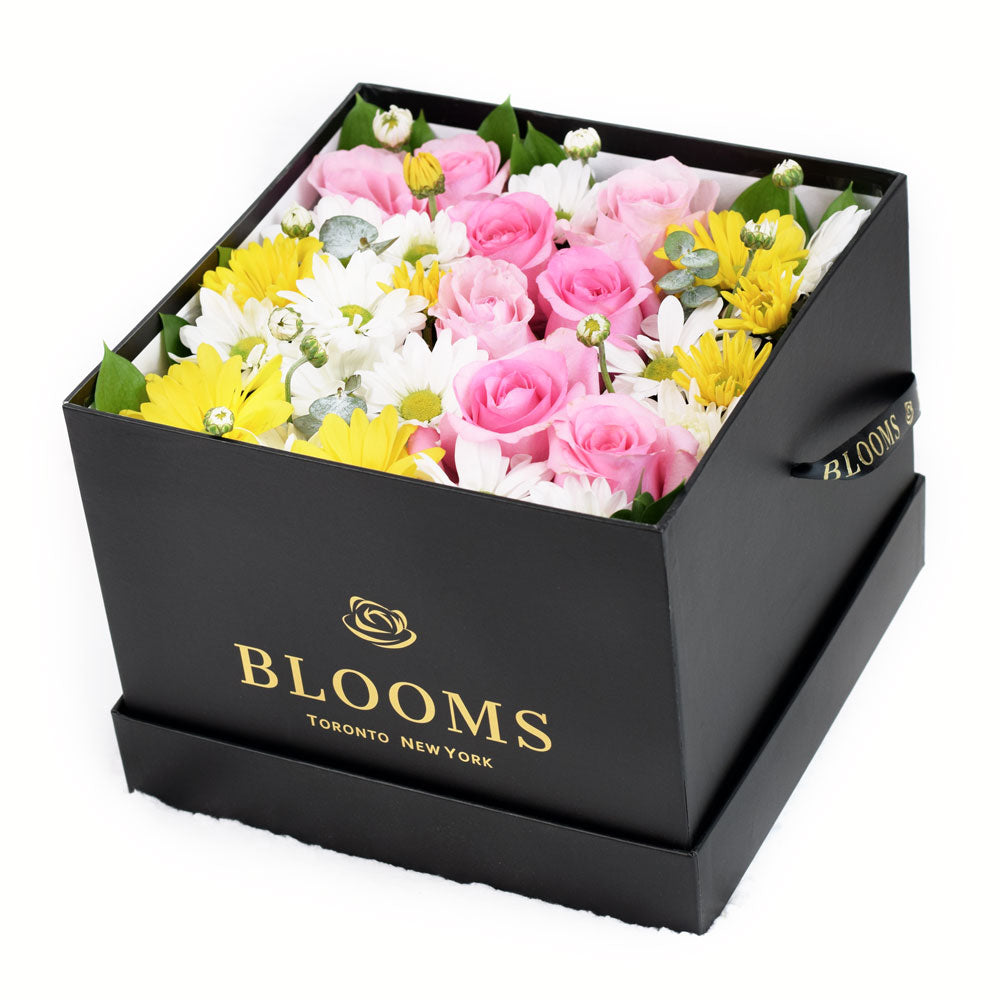 Vibrant Rose Arrangement in Square Black Hat Box – how the gift is presented