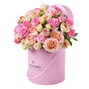 This large floral gift features pink and white roses gathered into a pink hat box for a wonderful way to breath of spring in any space.. America Blooms Delivery