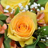 Autumnal floral hat box arrangement in yellows and oranges, from America Blooms - America Delivery.