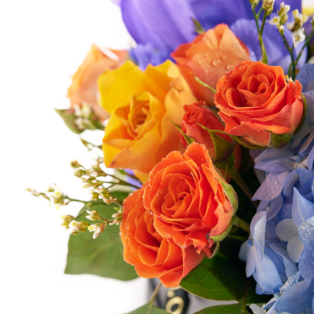 Bursting Beauty Iris Box Arrangement, Iris and mixed floral box arrangement from America Blooms - Same Day America Delivery.