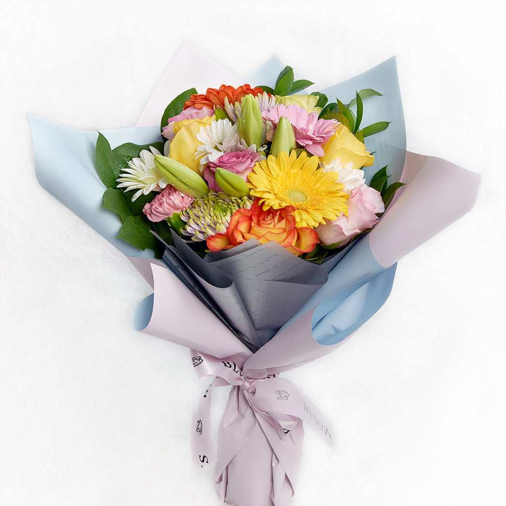 Premium Mixed Floral Bouquet Tied with Designer Ribbon – how the gift is presented