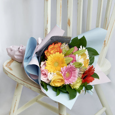Caribbean Sunrise Mixed Floral Bouquet. Multi-coloured mixed floral bouquet from America Blooms - Same Day America Delivery.