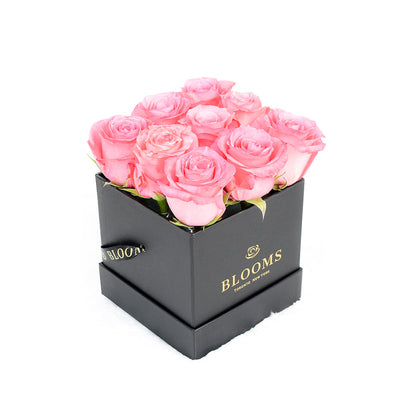 Impeccable pink rose hat box arrangement. America Blooms-America Blooms Delivery.