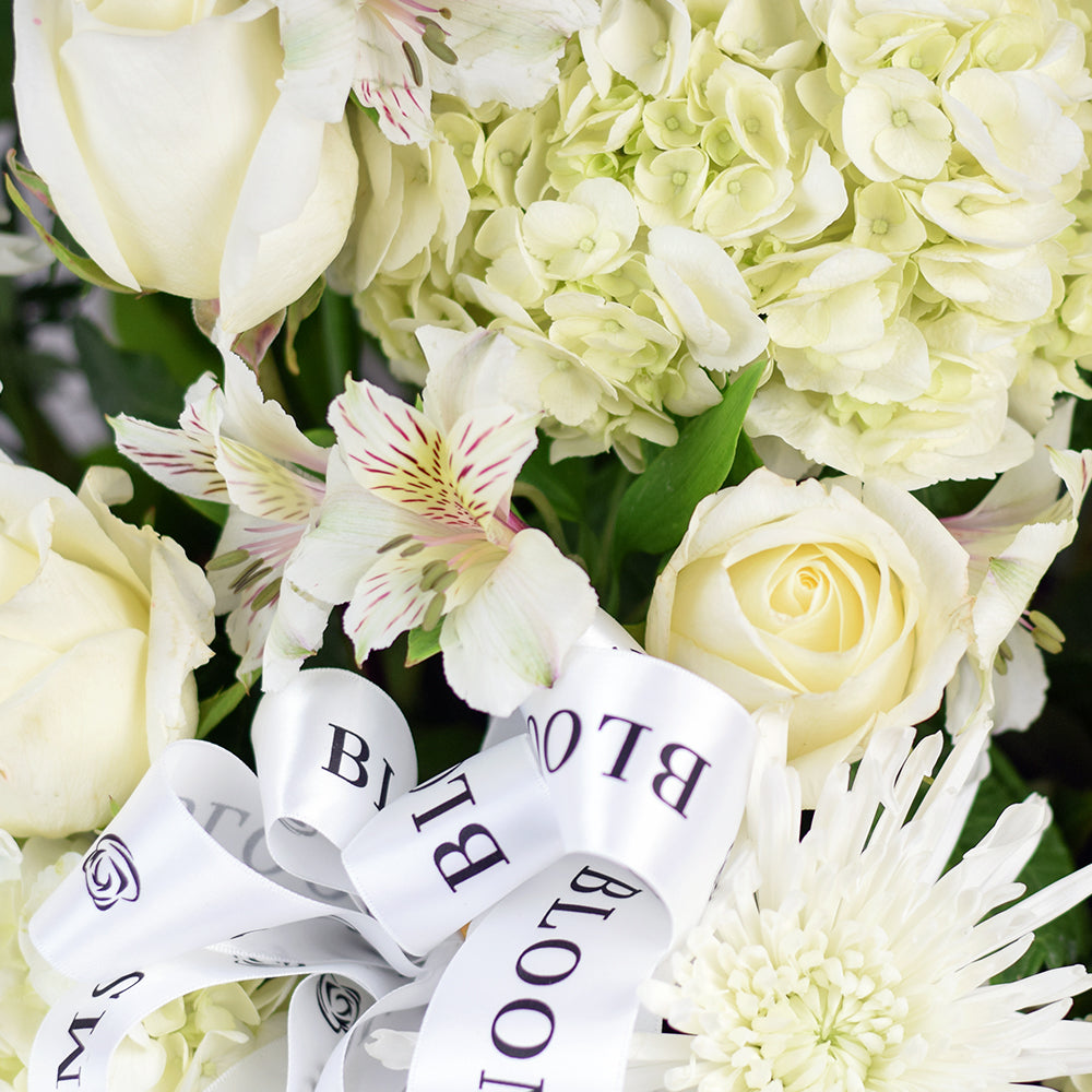Floral White Mixed Bloom Basket – how the gift is presented