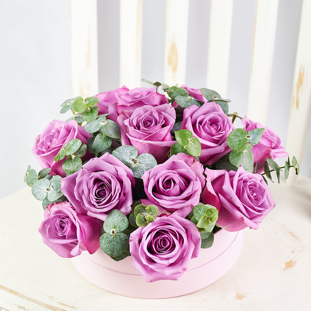 Purple Roses and Eucalyptus Hat Box Arrangement – how the gift is presented