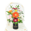 Brightly coloured mixed floral arrangement in a black box. Blooms America Delivery.