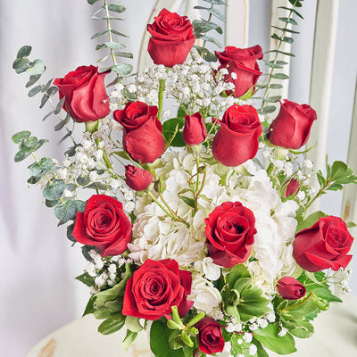 Rose & hydrangea floral arrangement. Blooms America Delivery.