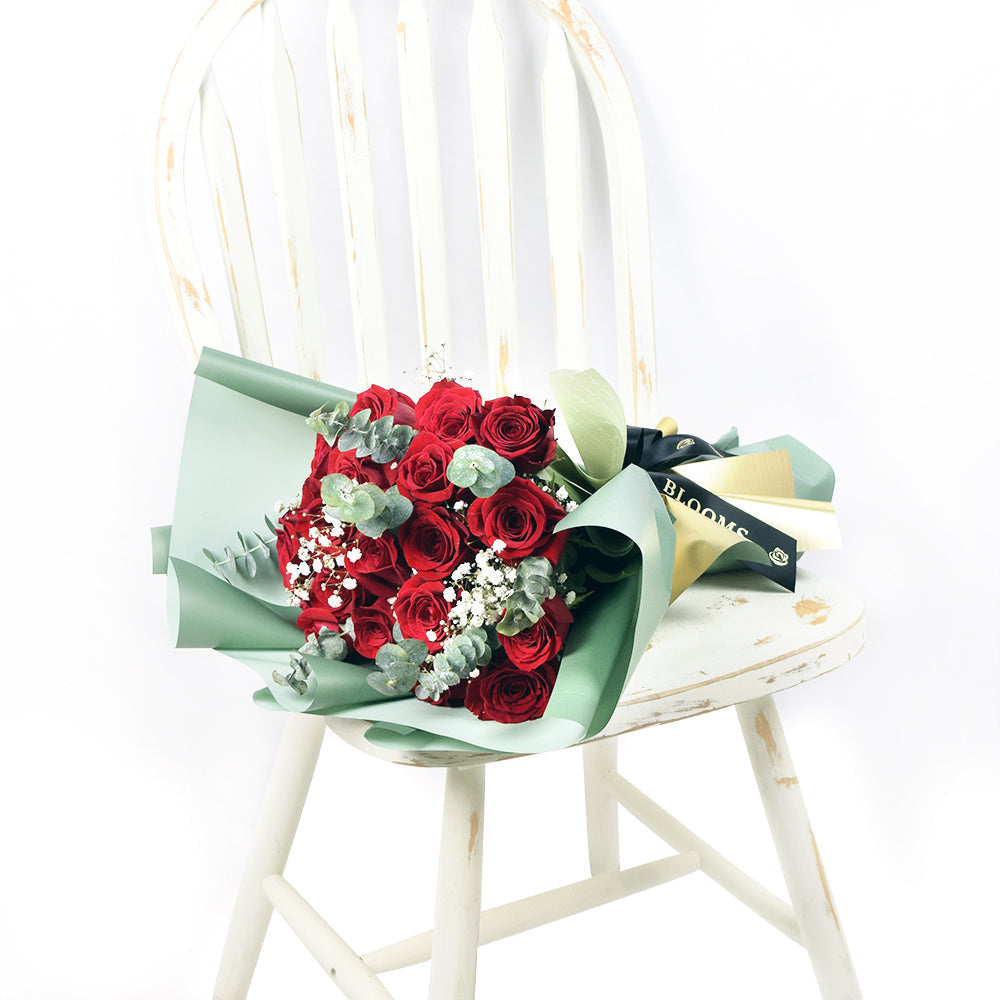 Signature Red Rose Bouquet Enhanced with Baby's Breath – how the gift is presented