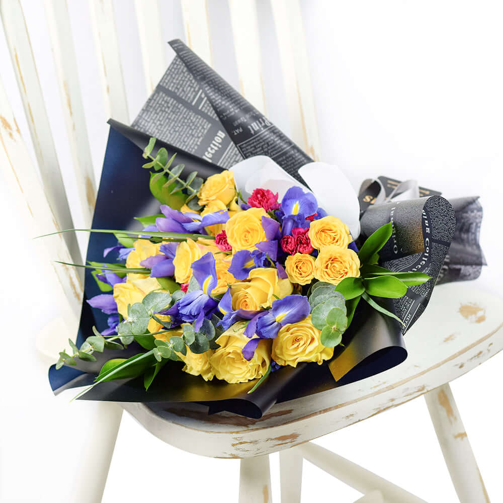 Vibrant Mixed Bouquet with Yellow Roses and Purple Irises – how the gift is presented