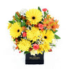 Sunrise mixed floral hat box arrangement. Blooms America Delivery