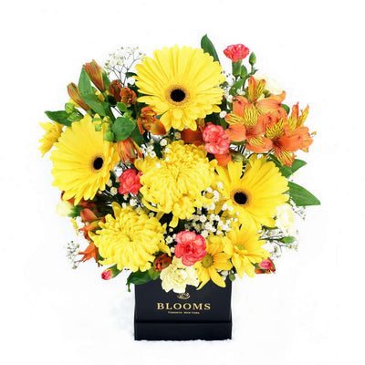 Sunrise mixed floral hat box arrangement. Blooms America Delivery