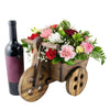 Carnation floral arrangement in a wooden cart planter America Blooms- America Blooms Delivery.